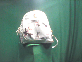 135 Degrees _ Picture 9 _ White Floral Design Backpack.png